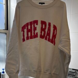 White Sweatshirt with Red 'THE BAR' Print